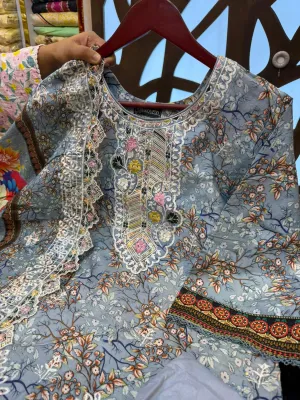 Fully stitched Swiss Lawn ensemble featuring premium embroidery and lace.